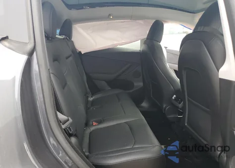 2023 Tesla Model Y из США, поврежденный, VIN 7SAYGDEE3PF884220